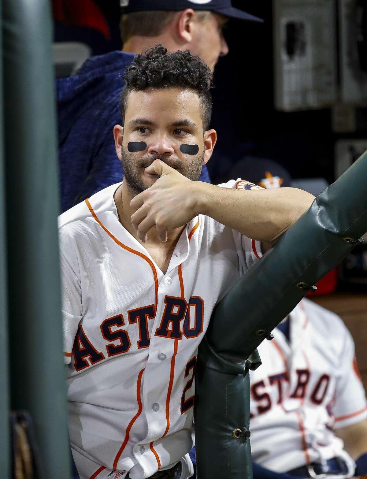 Houston Astros designated hitter Jose Altuve (27) reacts from the dugout at the end of Game 5 of the American League Championship Series at Minute Maid Park on Thursday, Oct. 18, 2018, in Houston.