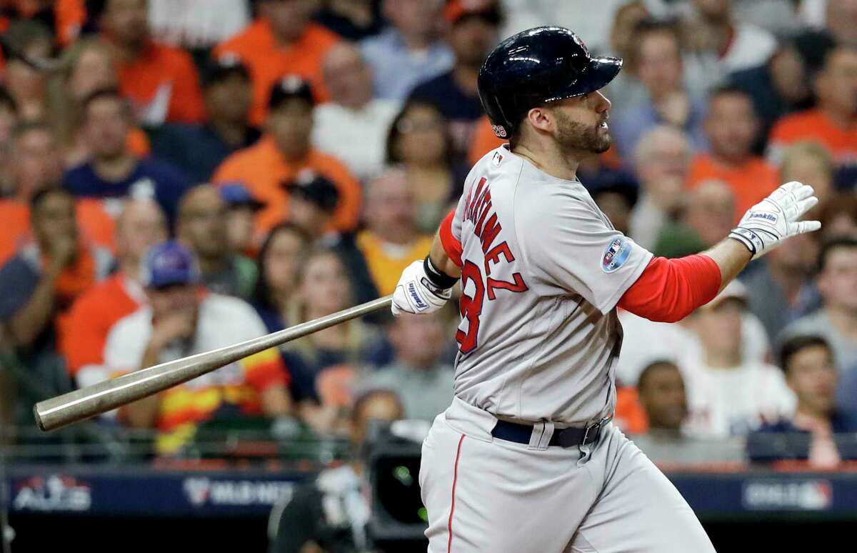 15. J.D. Martinez, Boston Red Sox 2019 pay: $25.6 million Overall rank: 94 Texas tie: Martinez was drafted and brought up through the Astros organization, but was eventually released. He then went on re-ignite his career and earn a big pay day with the Red Sox.   (AP Photo/David J. Phillip)