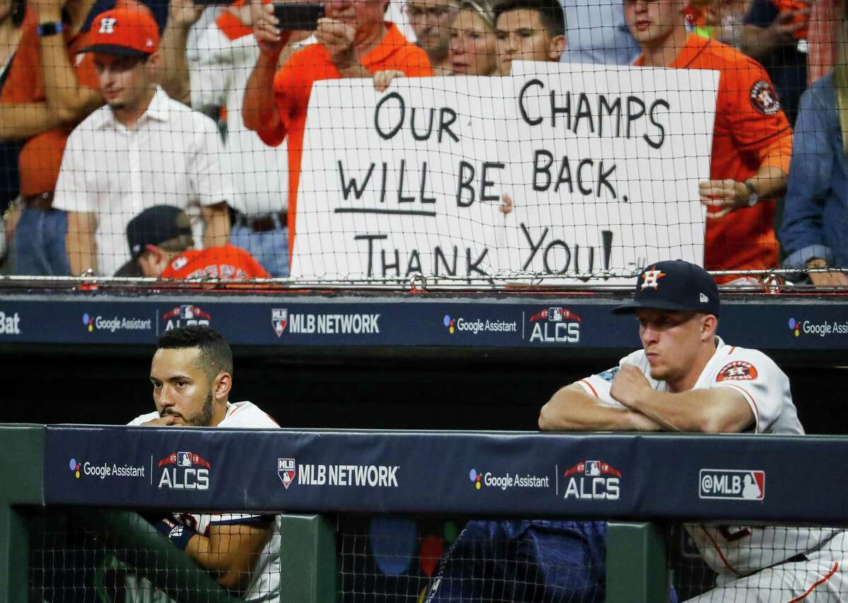 Las Vegas oddsmakers share the sentiments from these Astros' fans signs regarding the team's win total in 2019.