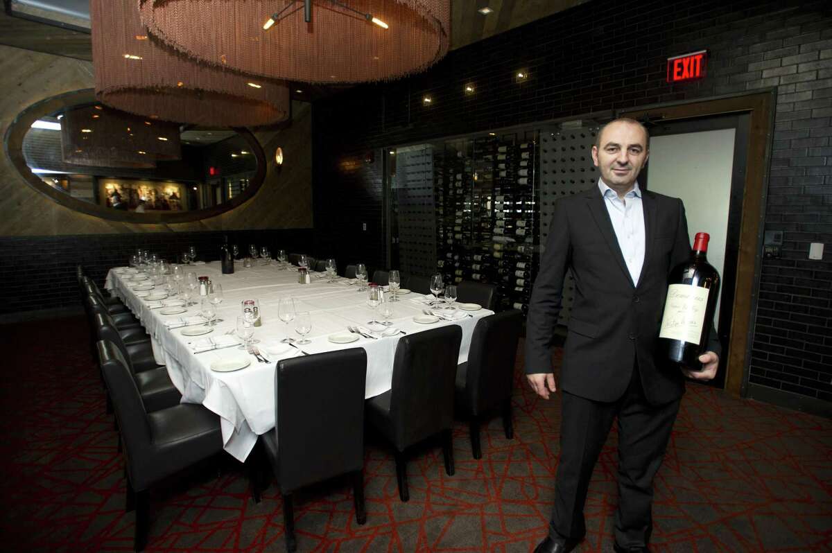 Blackstones Steakhouse co-owner Eddy Ahmetaj poses for a photo inside the new restaurant at 101 Broad St., in downtown Stamford, Conn., on Wednesday, Oct. 17, 2018.
