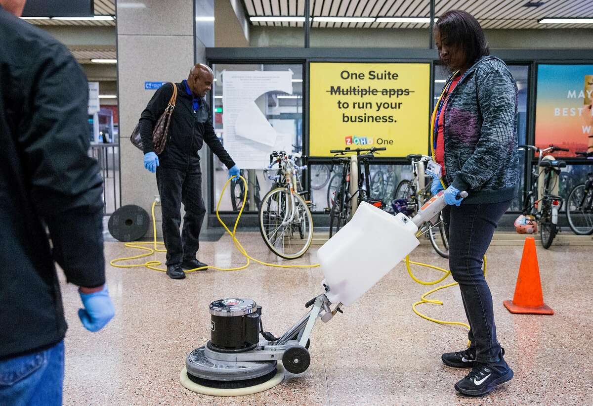 Bart System Service Worker Ebony Daniels practices using a heavy duty power cleaner to clean up biohazards during a training session held at Lake Merritt Bart Station in Oakland, Calif. Friday, Oct. 19, 2018.