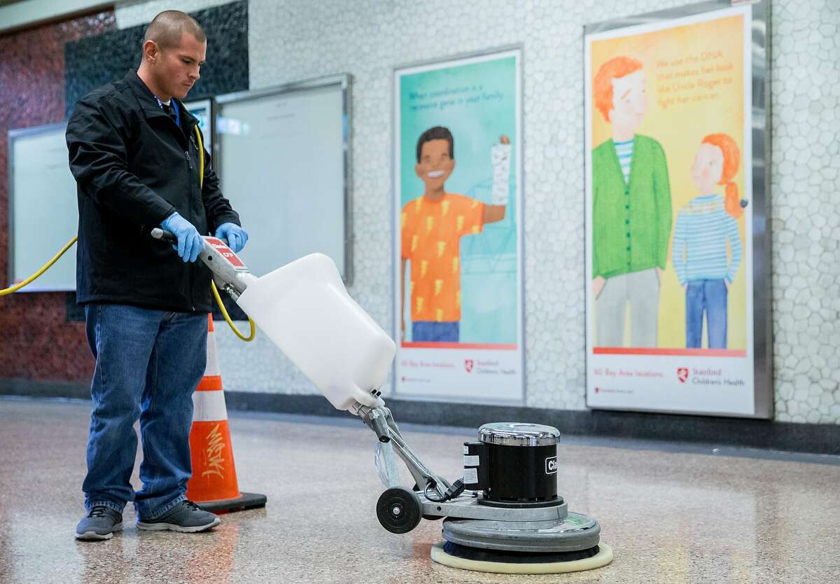 Bart System Service Worker Garrett Garza practices using a heavy duty power cleaner to clean up biohazards during a training session held at Lake Merritt Bart Station in Oakland, Calif. Friday, Oct. 19, 2018.