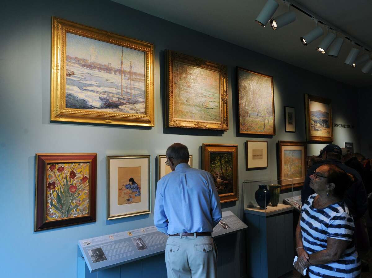 At top left, the Elmer Livingston MacRae oil on canvas painting “Schooner in the Ice, View from the Bush-Holley House,” done in 1900, along with other works could be seen in the new gallery during the opening day party. The society’s new campus was officially opened to the public after the ceremony that was led by Davidde Strackbein, chairman of the board of trustees of the society. The new campus includes a new library and archives, a Gallery for Special Exhibitions, a Gallery for Permanent Collections, a new museum lobby and museum store and an artist’s cafe. There is also a new extensive parking lot adjacent to the campus.