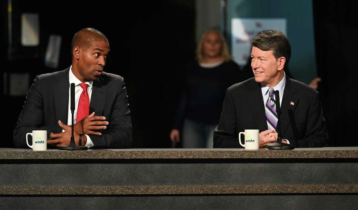 Candidates for the19th Congressional District Antonio Delgado, left and incumbent John Faso prepare for their debate at the studios of WMHT TV Friday Oct.19, 2018 in East Greenbush, N.Y. (Skip Dickstein/Times Union)