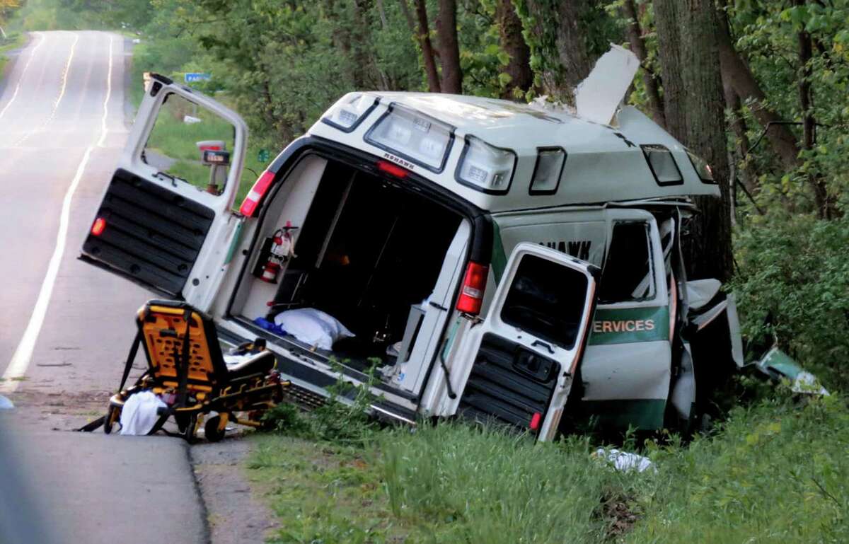 A Mohawk Ambulance crashed into trees along Route 20 on Wednesday evening, May 24, 2017, in Duanesburg, N.Y. The man being transported, Chris Aernecke, died in the crash. (Thomas Heffernan Sr./Special to the Times Union)