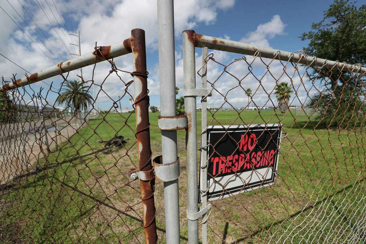 A fenced in field is all that is left of the Oleander Homes 5228 Broadway Wednesday, Oct. 3, 2018, in Galveston.
