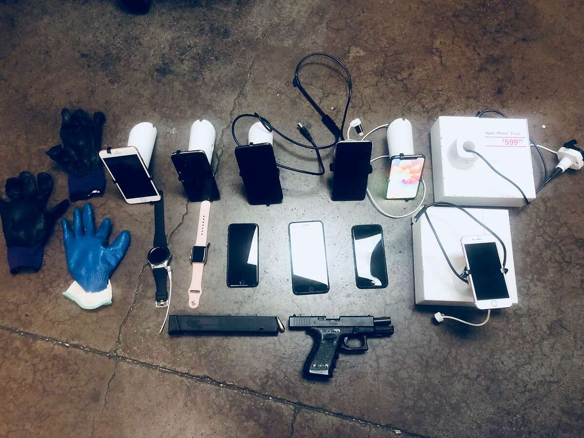 American Canyon police arrested two men they believe robbed a T-Mobile store in the southern Napa County town on Sunday, Oct. 21, 2018. Pictured is the loot police recovered from inside the suspects’ car after a high-speed chase and pursuit by a CHP aircraft. Police also found a handgun in the car but are not sure if it was used in the alleged heist.