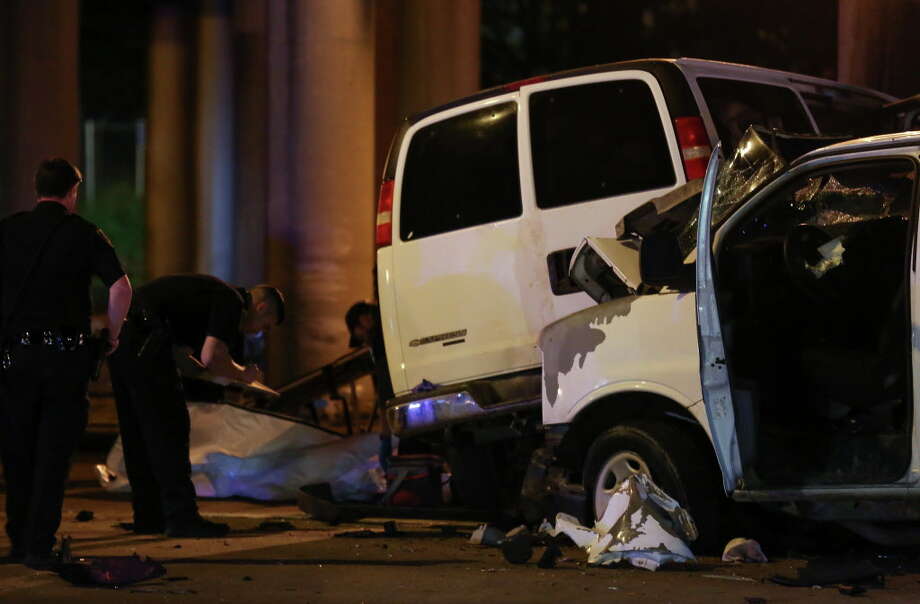 Houston Police Officers Investigate The Scene Of A Three Vehicle Crash On Airline Drive And Houston Police Officers Investigate The Scene Of A Three Vehicle Crash On Airline Drive And