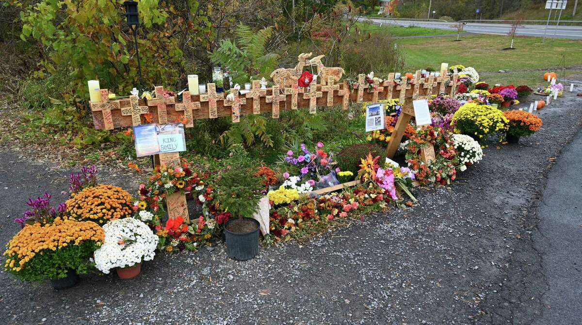 A makeshift memorial is made at the site of the limousine accident that took the lives of 20 people on Monday, Oct. 22, 2018, in Schoharie, N.Y. (Skip Dickstein/Times Union)