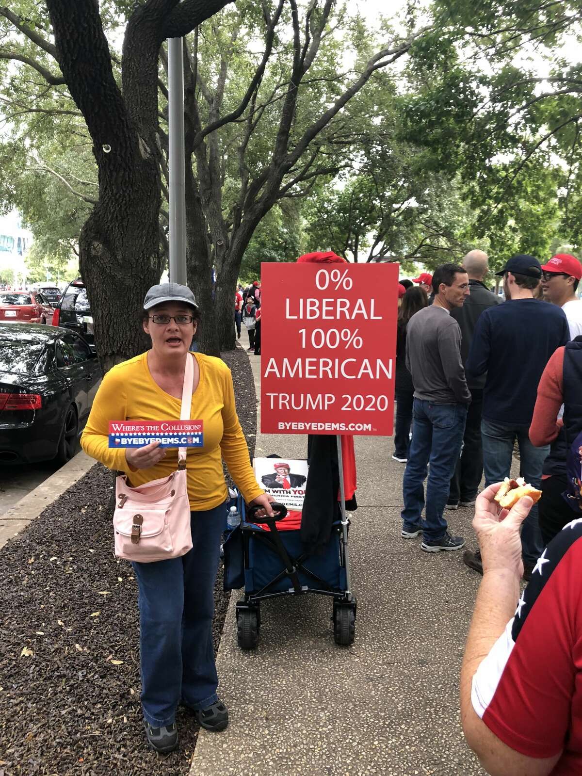Vendors advertised anti-liberal messages as they snaked around the enormous lines on Monday. 