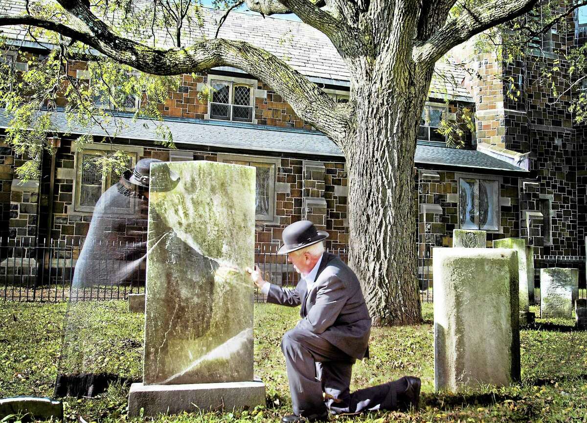(File photo by Melanie Stengel New Haven Register) ¬ Susan Walker (L) and Jon Purmont, of the West Haven Historical Society, will join other members in presenting a Graveyard Lantern Tour Saturday from 5 p.m. to 7 p.m. at the two cemeteries near the West Haven Green. Tickets are $5 for adults and $2 for children 12 and under and must be purchased at the Historical Society office in the Poli House, 686 Savin Ave., the night of the event.