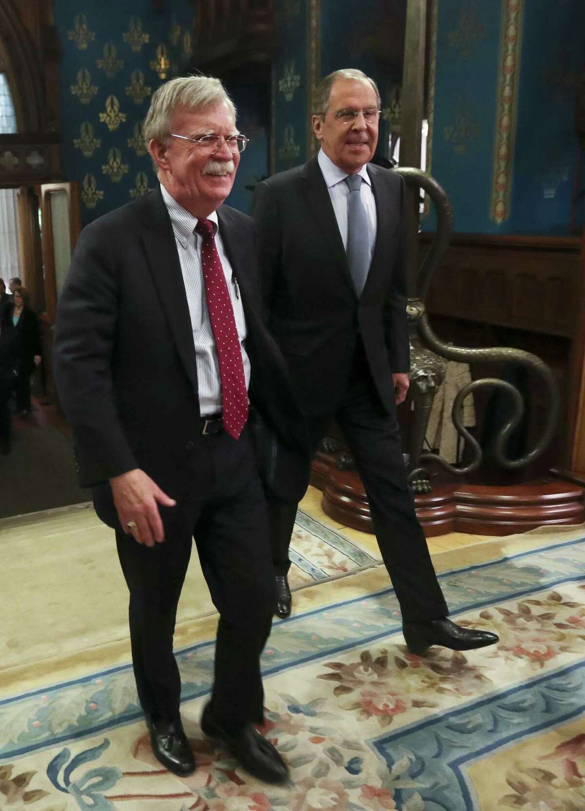 U.S. National Security Adviser John Bolton, left, and Russian Foreign Minister Sergey Lavrov enter a hall for their talks in Moscow, Russia, Monday, Oct. 22, 2018. President Trump’s national security adviser has met with top Russian officials after Trump declared he intended to pull out of a 1987 nuclear weapons treaty.