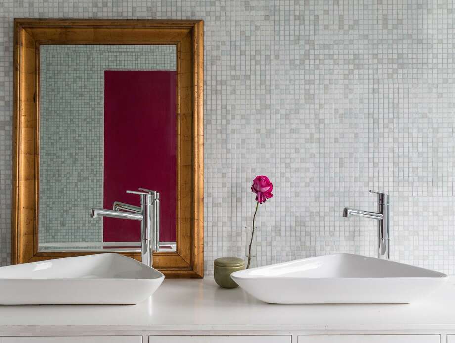 Vessel sinks are losing popularity as a master bath fixture because they’re hard to keep clean, take up counter space and can be too high to use comfortably. Photo: HGTV.com / Seth Caplan