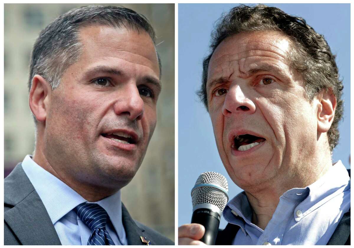 FILE - In this combination photo, New York Republican gubernatorial candidate Marc Molinaro, left, speaks at a news conference in New York on Sept. 14, 2018, and New York Gov. Andrew Cuomo, right, speaks a news conference in in Tarrytown; N.Y., on May 8, 2018. Cuomo is balking at requests to debate his opponents, potentially leaving New Yorkers without the chance to see the candidates for governor face each other before the Nov. 6 election. Molinaro had asked for a one-on-one debate with the two-term incumbent, and three third-party candidates had pushed for a more inclusive exchange. (AP Photos/Bebeto Matthews, left, and Julio Cortez, Files)