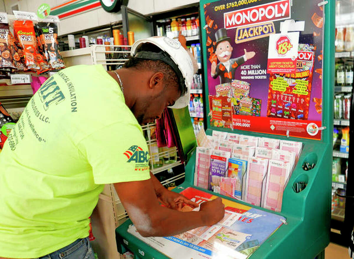 Jean Pierre fills out several Mega Millions lottery tickets for purchase. No one won the $1 billion jackpot in Saturday night’s drawing, which means the top prize for tonight’s Mega Millions drawing would be the largest lottery jackpot in U.S. history. John Raoux | AP