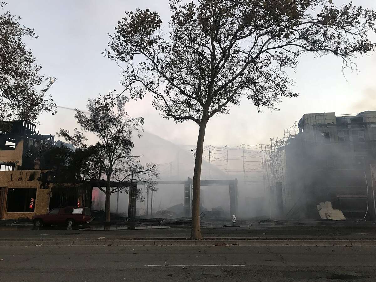 A huge fire broke out at a construction site in Oakland early Tuesday destroying six buildings that were part of a new condo project, authorities said