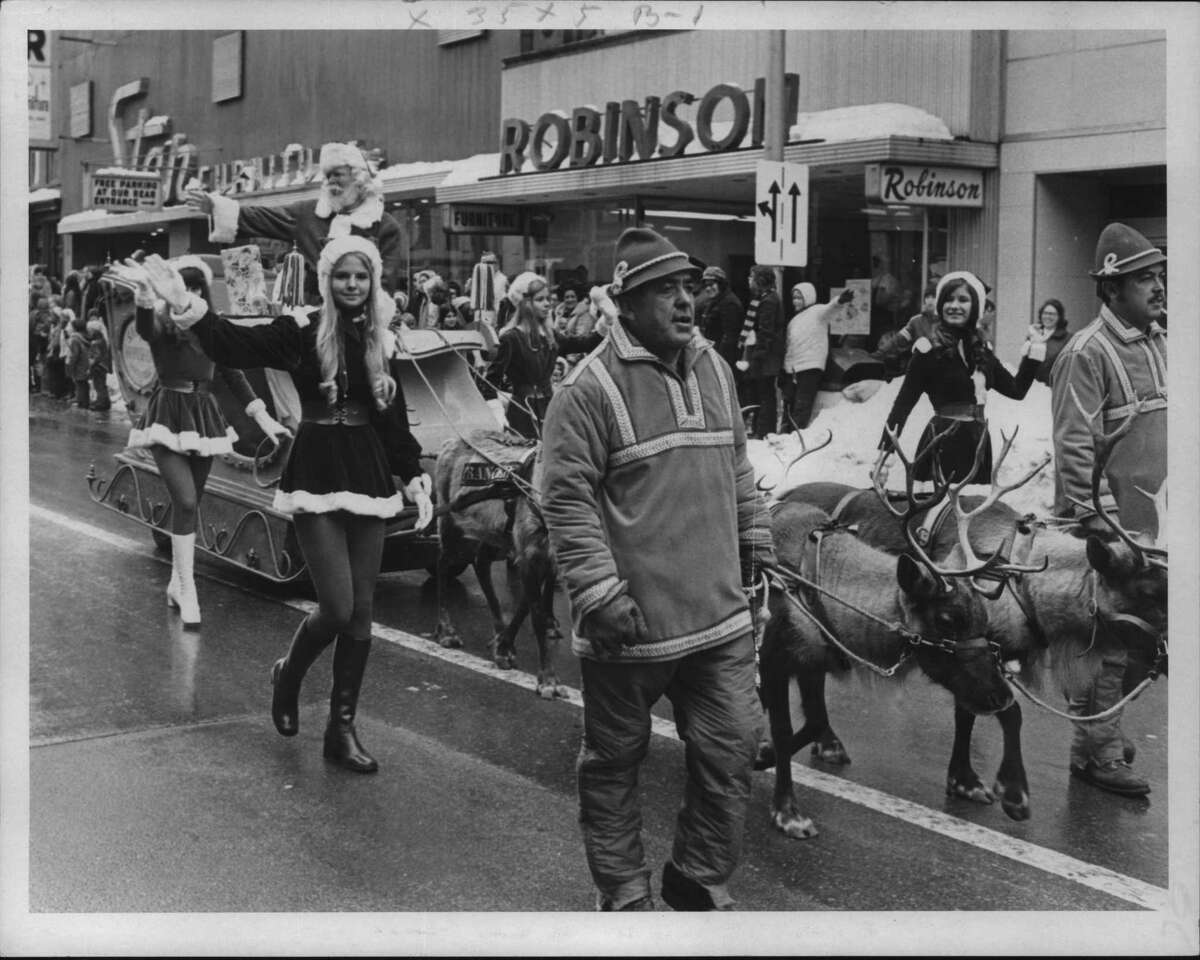 Reindeer pull Santa's sleigh in Schenectady, New York Christmas parade. November 28, 1971 (Raymond B. Summers/Times Union Archive)