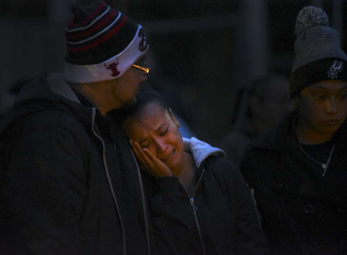 Patricia Slack, mother of Charles Roundtree, an 18-year-old who was shot and killed by San Antonio police early Wednesday in the 200 block of Roberts Street, weeps during a gathering to memorialize him on Wednesday night, Oct. 17, 2018. Roundtree was unarmed and was struck by a bullet fired at another person.