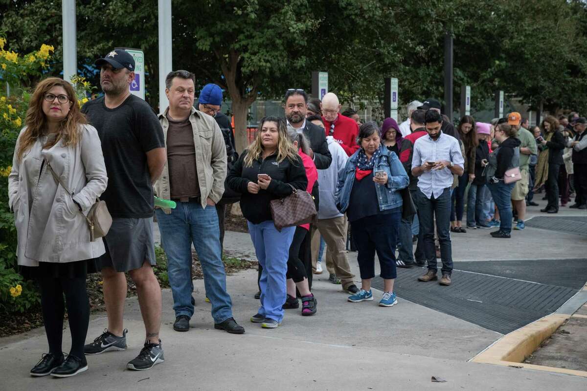 HOUSTON, TX - OCTOBER 22: People wait in line to vote at a polling place on the first day of early voting on October 22, 2018 in Houston, Texas. Democratic Senate candidate Rep. Beto O'Rourke is running against Sen. Ted Cruz (R-TX) in the midterm elections. (Photo by Loren Elliott/Getty Images)