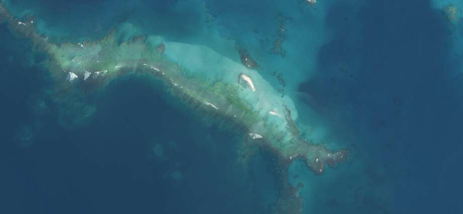 Wiped out island 2: Satellite imagery shows what's left of East Island in October 2018 after Hurricane Walaka. Photo: U.S. Fish And Wildlife Service