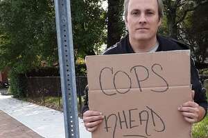 Court supports suit of Stamford man with 'cops ahead' sign