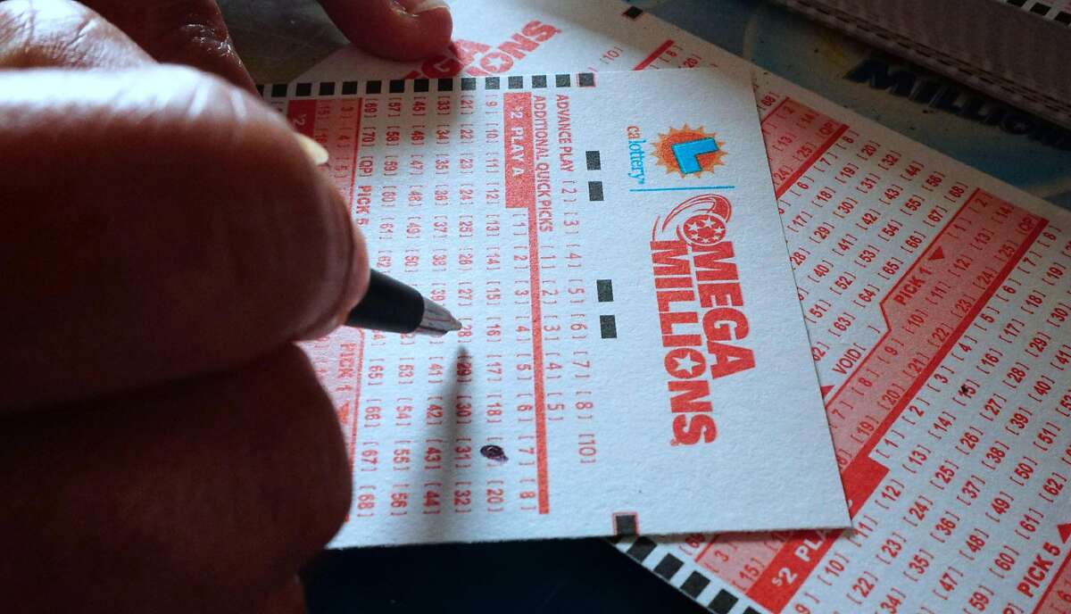 Numbers are selected on a Mega Millions lottery ticket in Los Angeles on Oct. 23, 2018.  