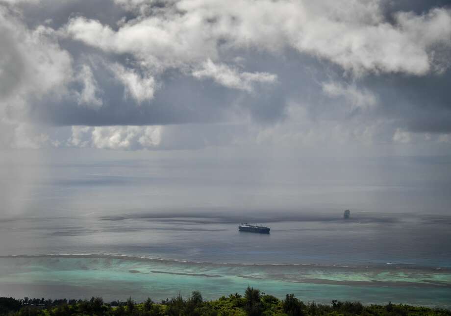 The Pacific Ocean as seen from top of Mount Tapochau on Saipan Island, one of the Northern Mariana Islands, in the Pacific Ocean. A strengthening Super Typhoon Yutu, with sustained winds of 180 mph, is on a trek through the Northern Mariana Islands. The storm is roaring across the islands of Saipan and Tinian, both U.S. territories, and will become among the most intense if not the strongest storm on record to impact U.S. soil. Photo: Yuri Smityuk/Yuri Smityuk/TASS