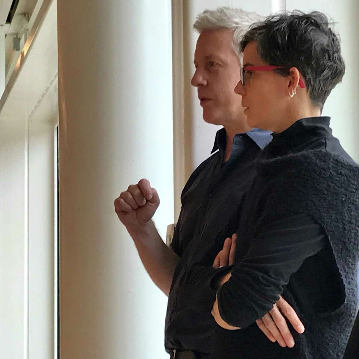 Moody Center artist-in-residence Matthew Ritchie and San Francisco choreographer Hope Mohr confer during a moment of rehearsal for Saturday's performance, "Dimensions Variable," by Mohr's company within Ritchie's installation "Demon in the Diagram."