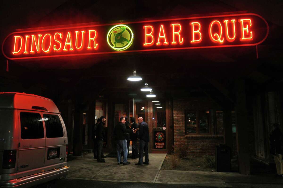 Guests enter for a "sneak peek" of the new Dinosaur Bar B Que in Troy, NY, on Monday evening November 8, 2010. ( Philip Kamrass / Times Union )