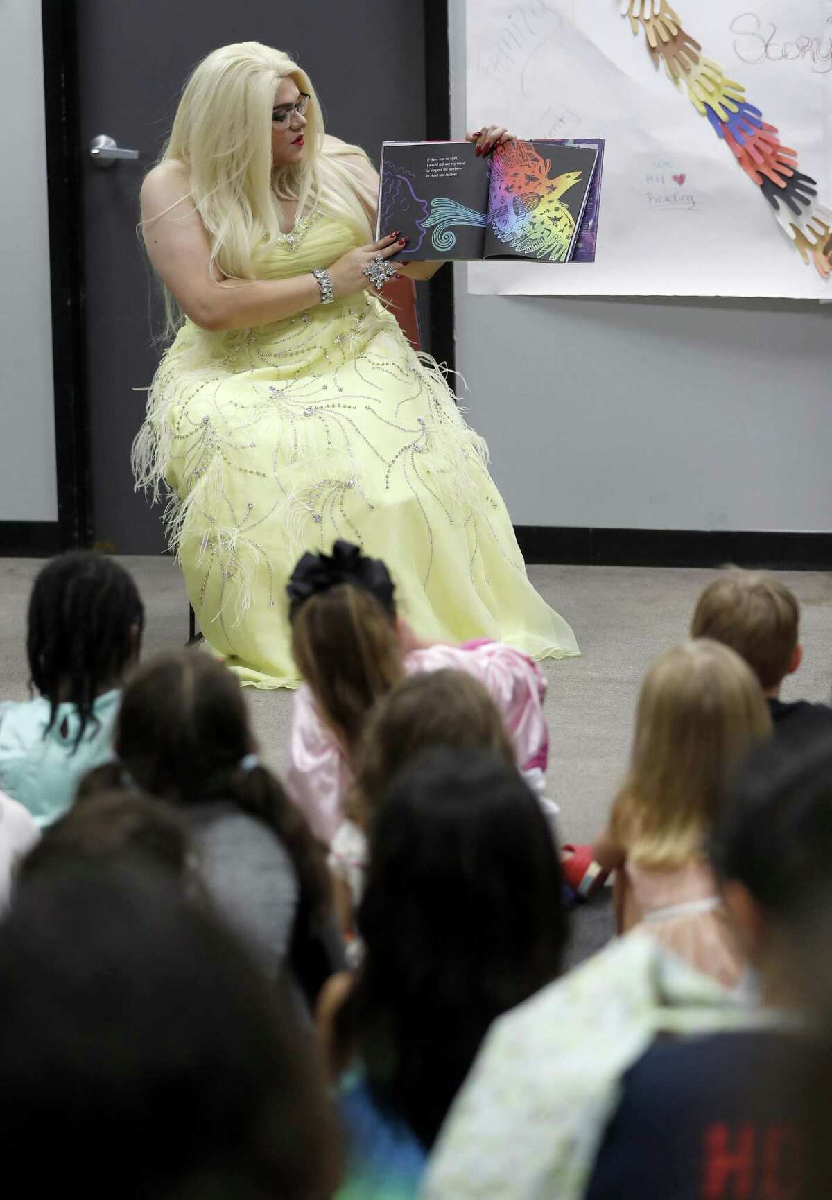 Tatiana reads a book to children during the monthly Drag Queen Story Time at Freed-Montrose Neighborhood Library, Saturday, September 29, 2018, in Houston. Saturday marked the one-year anniversary of the story hour, which happens on the last Saturday of every month.