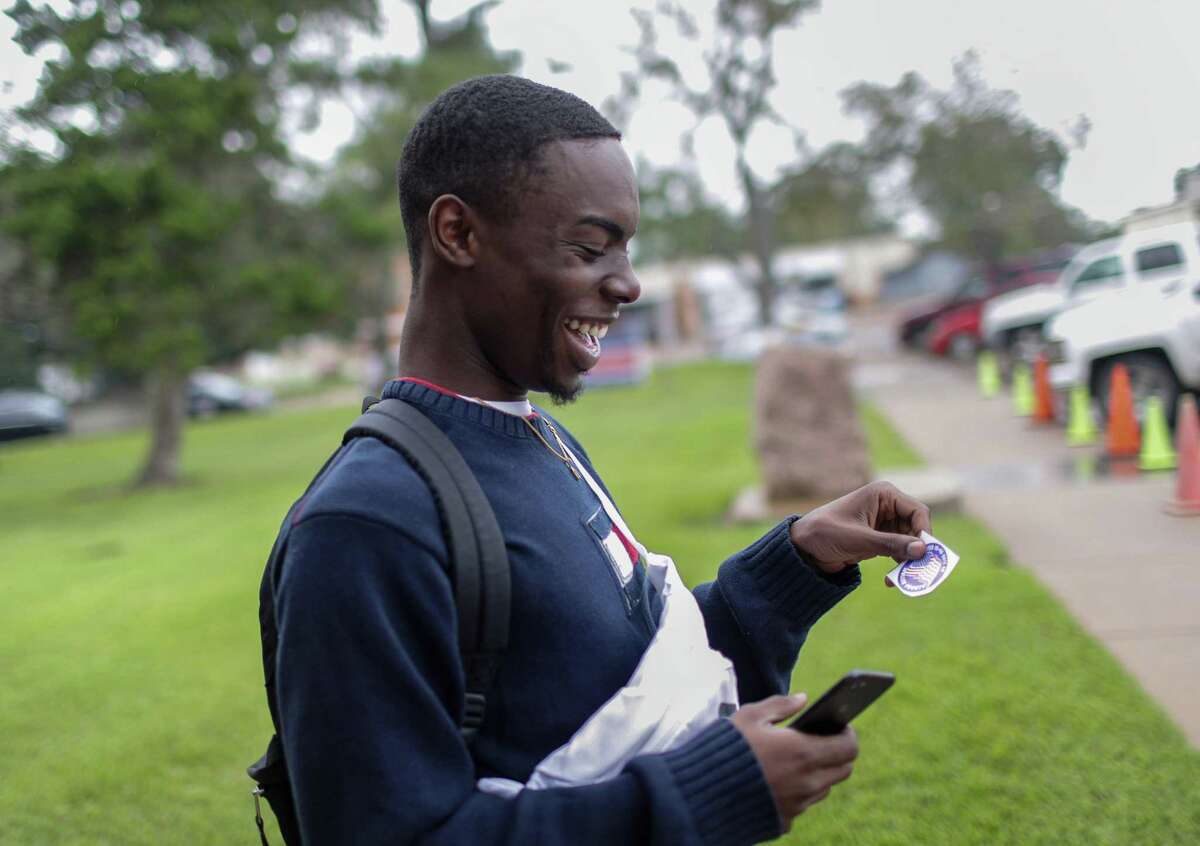 Drew William, a 22-year-old sophomore at Prairie View A&M University, smiles after voting at the Waller County Courthouse, during early voting Wednesday, Oct. 24, 2018, in Hempstead.