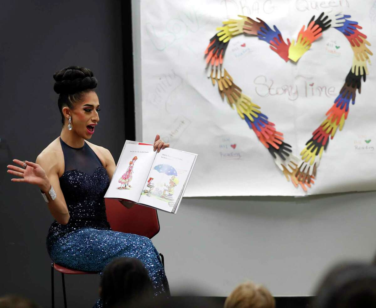 Angelina reads a book to children during the monthly Drag Queen Story Time at Freed-Montrose Neighborhood Library, Saturday, September 29, 2018, in Houston. Saturday marked the one-year anniversary of the story hour, which happens on the last Saturday of every month.
