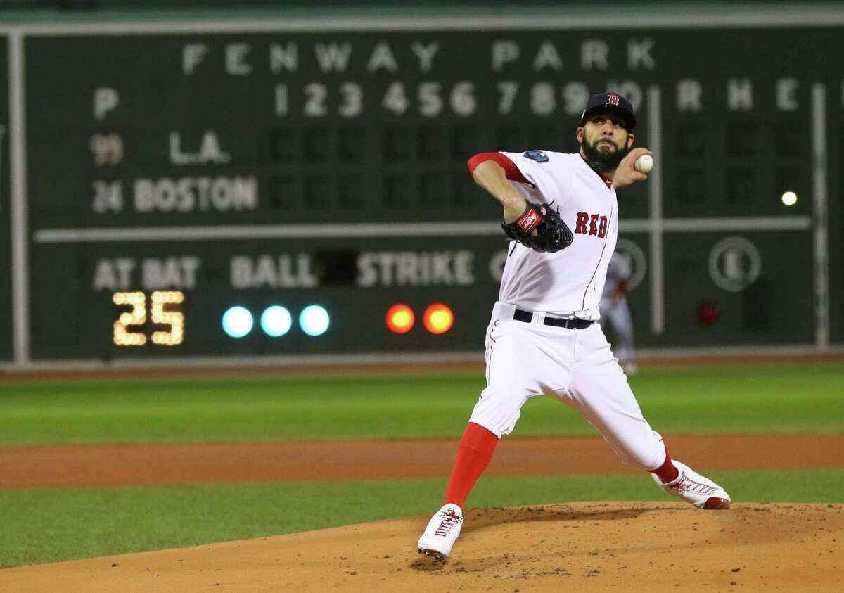 Boston Red Sox starting pitcher David Price throws during the first inning of Game 2 of the World Series baseball game against the Los Angeles Dodgers Wednesday, Oct. 24, 2018, in Boston.
