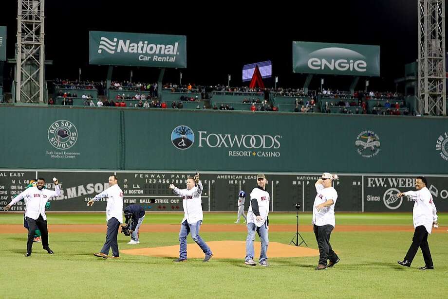 Memebers of the 2004 World Series Champion Boston Red Sox throw out the ceremonial first pitch prior to Game Two of the 2018 World Series at Fenway Park on October 24, 2018 in Boston, Massachusetts. Former Red Sox great Curt Schilling was not invited to take part, despite living fifteen minutes away. Photo: Maddie Meyer, Getty Images