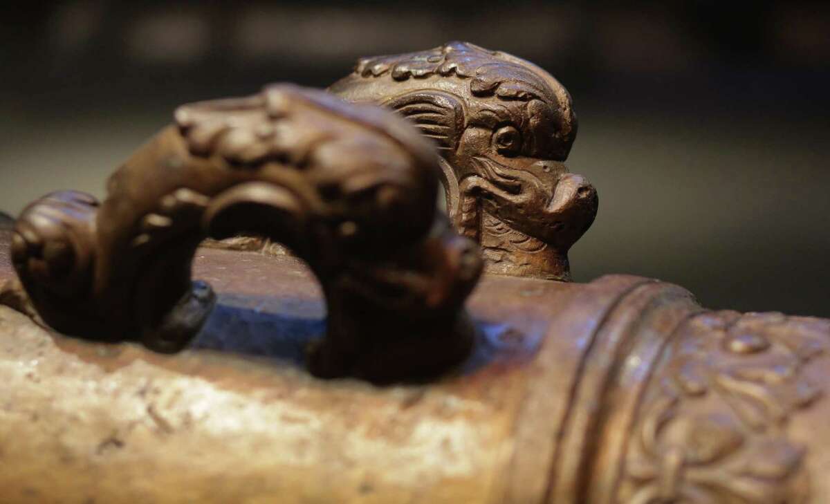 This 2014 photo shows ornate lifting handles on a bronze canon recovered from the French frigate La Belle on display at the Bullock Texas State History Museum in Austin. The 1686 shipwreck and research of some 1.8 million artifacts recovered from excavations in 1996 and 1997 will be the topic of a free public forum from 7 to 9 p.m. Friday at the Menger Hotel, during the 89th annual meeting of the Texas Archaeological Society.
