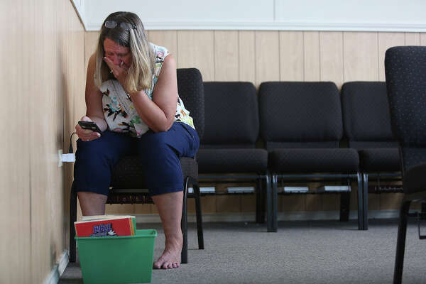 Sherri Pomeroy looks through the phone belonging to her daughter, Annabelle, for the first time since Annabelle was killed. After sorting through boxes of unclaimed belongings, Sherri plugged in Annabelle's phone, hoping to see new photos from before the shooting.