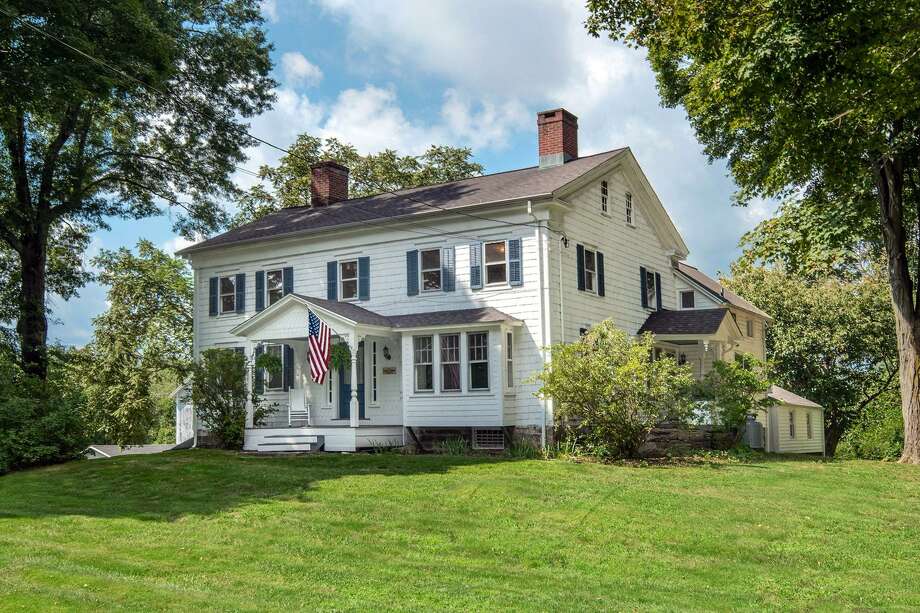  New  England  farmhouse  a classic outhouse and all 