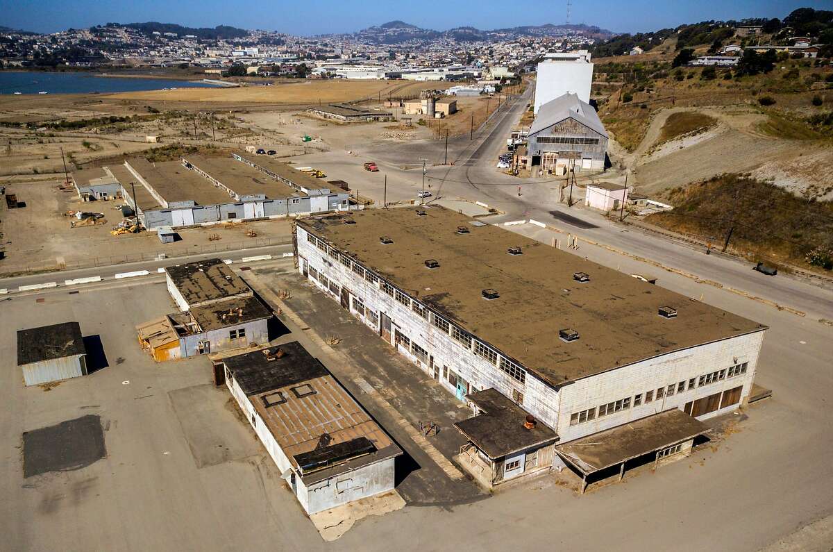 Aerial photos of Hunters Point Naval Shipyard Building 401 in Parcel G in San Francisco, Calif., on Tuesday, September 11, 2018. The Navy's retesting plan for Parcel G is being brought into question. When the U.S. Navy pledged to perform new soil tests at its Superfund waste site in San Francisco, the priority was "to protect the human health and the environment." But the Navy's re-testing plan is largely based on a cost-cutting report it paid a defense contractor to put together more than six years ago. What's more, the old report relies on data collected by Tetra Tech, the cleanup firm that submitted fake measurements and got caught. It essentially advocates for lowering cleanup standards and leaving more radioactivity in the ground. Multiple government agencies have now come out against the Navy?s plan to re-test Parcel G, saying that it could put public health at risk if it is not changed. Environmental experts agree and say even if the Navy listens to those agencies the plan is flawed and falls far short of what was promised in the wake of the Tetra Tech fraud revelations.