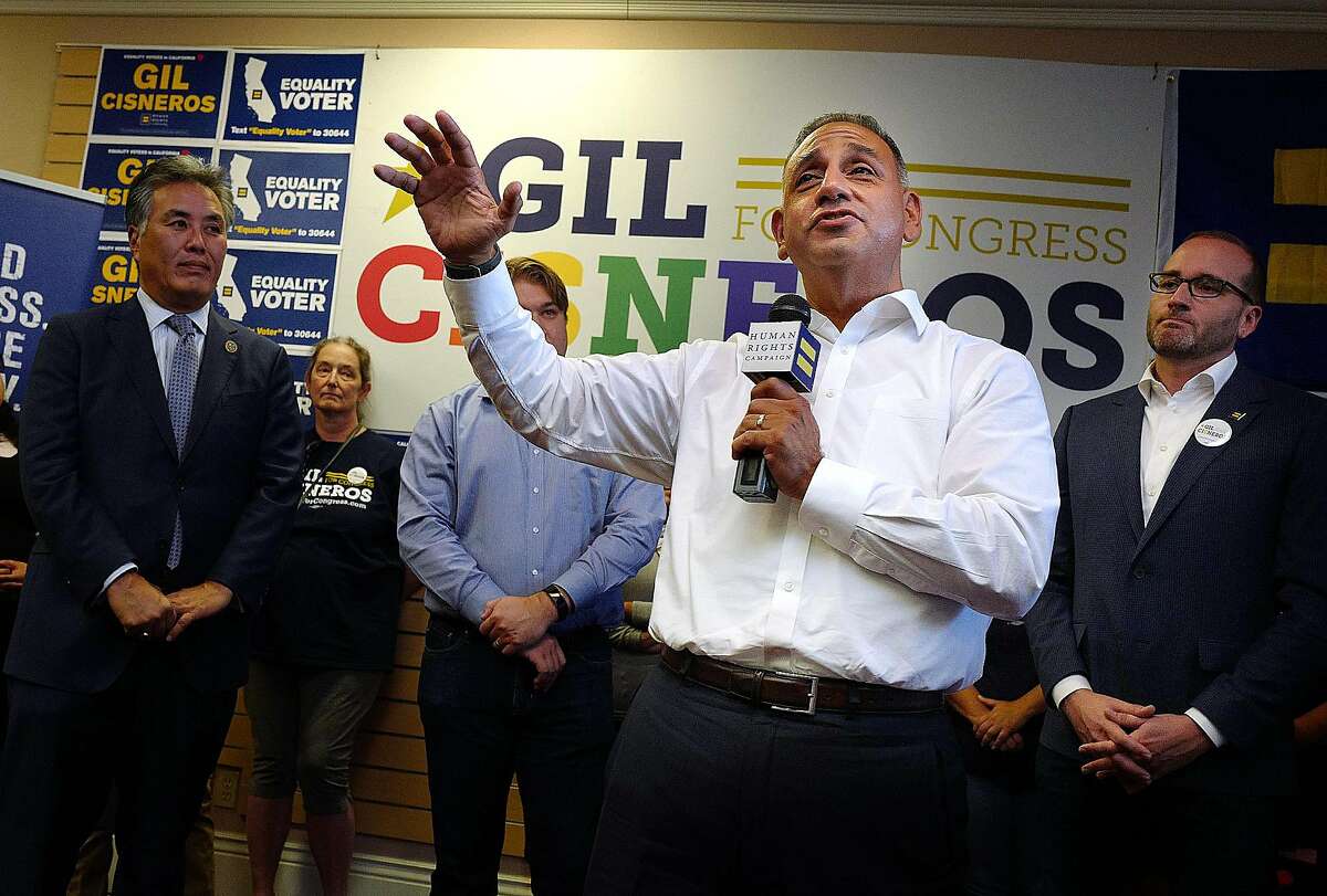 Gil Cisneros speaks to supporters in the 39th Congressional district, which he hopes to win Tuesday, Oct. 16, 2018 in Brea. On his left is Congressman Mark Takamo, Phil Janowicz of Solutions for Congress and on his right is Chad Griffin, President of the Human Rights Campaign. (Photo by Michael Fernandez, Contributing Photographer)