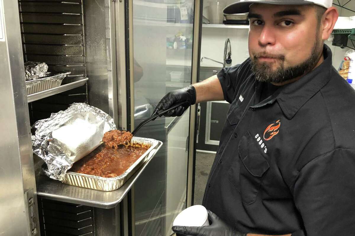 Raul Jacobo Jr., 37, co-owner and pitmaster of Cobo's LLC, looks forward to a great opening day.