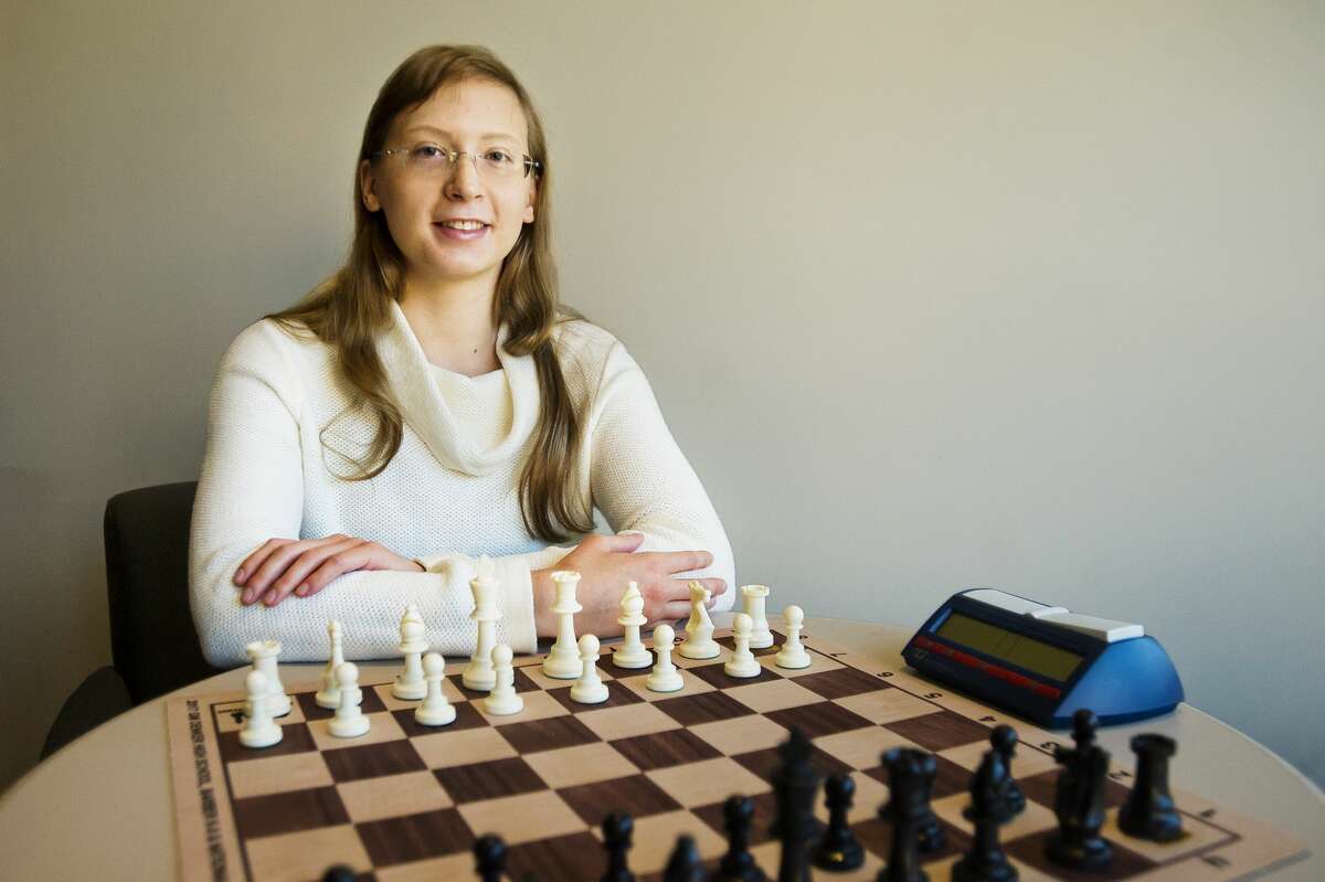 Sasha Konovalenko, a 16-year-old junior at H.H. Dow High School and competitive chess player, poses for a portrait at the Midland Daily News on Saturday, Oct. 20, 2018. At the recent Michigan Open in Cadillac, she finished fourth in the state open division, and for the third straight year she finished higher than any other woman. (Katy Kildee/kkildee@mdn.net)