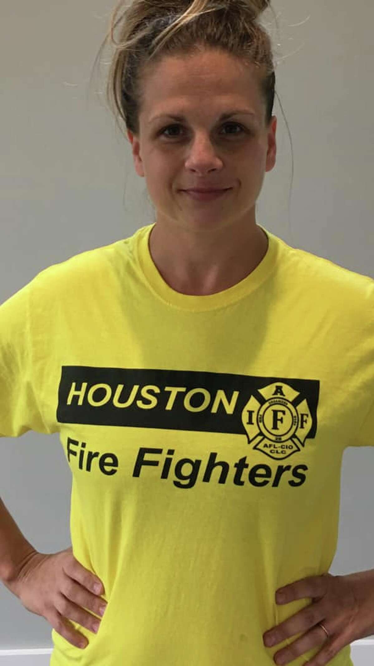 Jillian Ostrewich, the wife of a Houston firefighter, said she was asked to turn her Houston Fire Fighters shirt inside out at a polling station earlier this week, even thought the shirt didn't appear to break state election law. The fire union said around 25 other firefighters had been asked to cover their generic fire department shirts. >>>