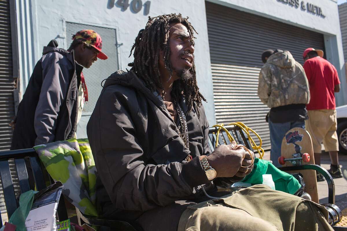 Onnie P. Broussard, 37, talks to outreach specialists from the Homeless Outreach Team. Broussard grew up in the Bay View and has been on the street for almost 2 years. Bay View on Monday, September 24, 2018 in San Francisco Calif.