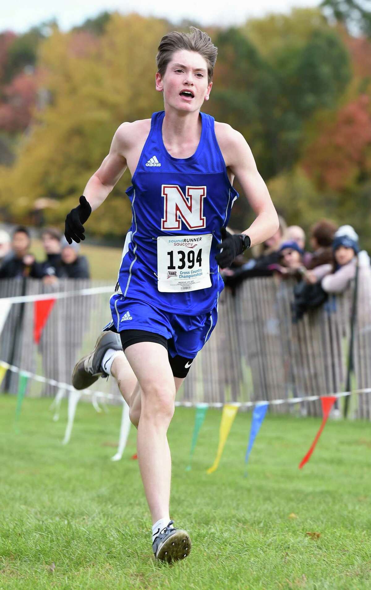 Eddie Nicholas of Nonnewaug finishes first in the CIAC Boys Class SS Championship cross county race at Wickham Park in Manchester with a time of 16:08 on October 26, 2018.