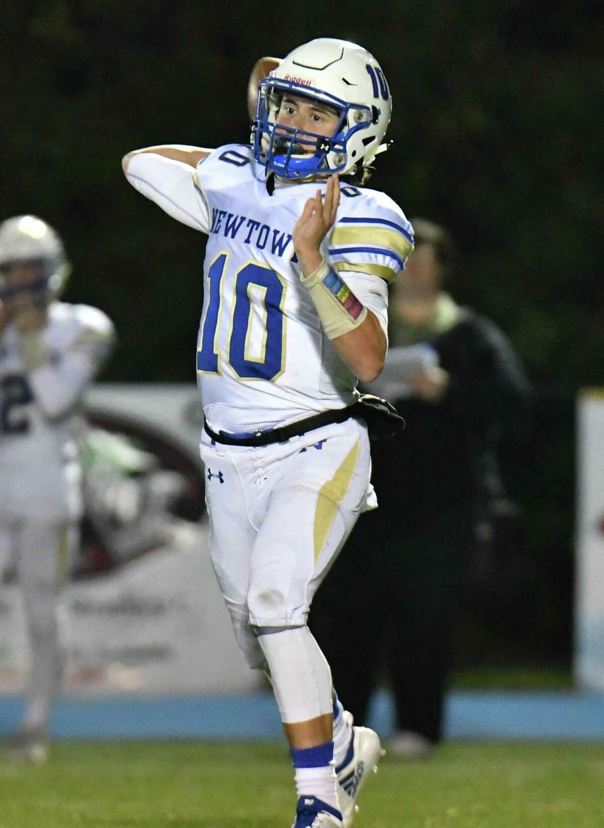 Luke Melillo (7) of the Newtown Nighthawks passes during a game against the Bunnell Bulldogs on Friday October 26, 2018, at Bunnell High School in Stratford, Connecticut.