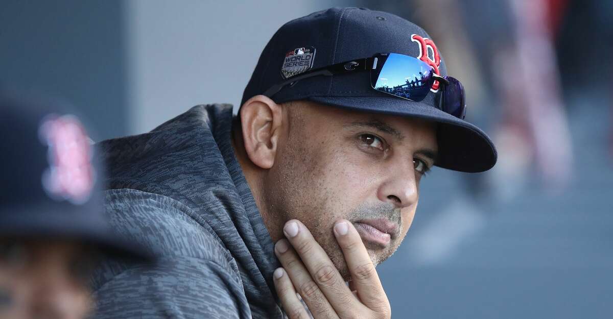 LOS ANGELES, CA - OCTOBER 26: Alex Cora #20 of the Boston Red Sox looks on prior to Game Three of the 2018 World Series against the Boston Red Sox at Dodger Stadium on October 26, 2018 in Los Angeles, California. (Photo by Ezra Shaw/Getty Images)