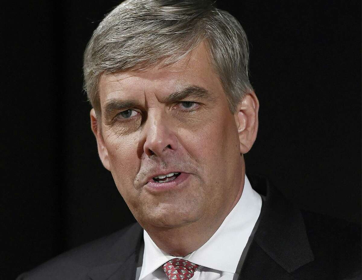 FILE - In this Sept. 26, 2018, file photo, Republican businessman Bob Stefanowski speaks to the media after gubernatorial debate at the University of Connecticut in Storrs, Conn. Stefanowski touts his work at blue-chip companies like General Electric and UBS Investment Bank. Rivals criticized the most recent item on his resume: CEO of DFC Global company, which offers financial products that are not legal in Connecticut. Stefanowski counters that his experience straightening out the troubled company would serve him well fixing the state's stubborn budget deficits. (AP Photo/Jessica Hill, File)