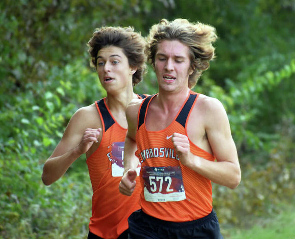 Edwardsville’s Max Hartmann, left, and Roland Prenzler near the second-mile mark of the Class 3A Quincy Sectional on Saturday inside Bob Mays Park in Quincy.