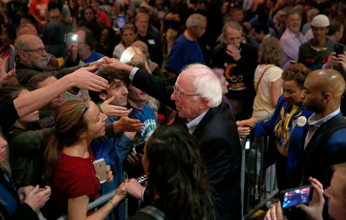 Vermont Sen. Bernie Sanders greets supporters after appearing at a campaign rally for Rep. Barbara Lee at the Berkeley Community Theater in Berkeley, Calif. on Saturday, Oct. 27, 2018.