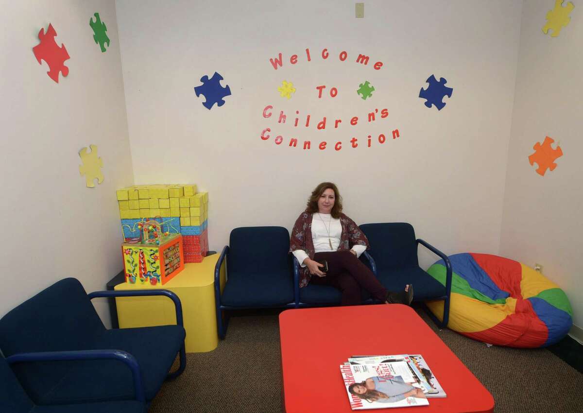 Human Services Council Director of Development and Communications, Kimberly Killoy in the Children's Connection waiting room at their facility on Park Street in Norwalk, Conn. HSC helps more than 8,000 people per year focusing on drug prevention, housing, homelessness, hunger and physical and behavioral healthcare for youth.